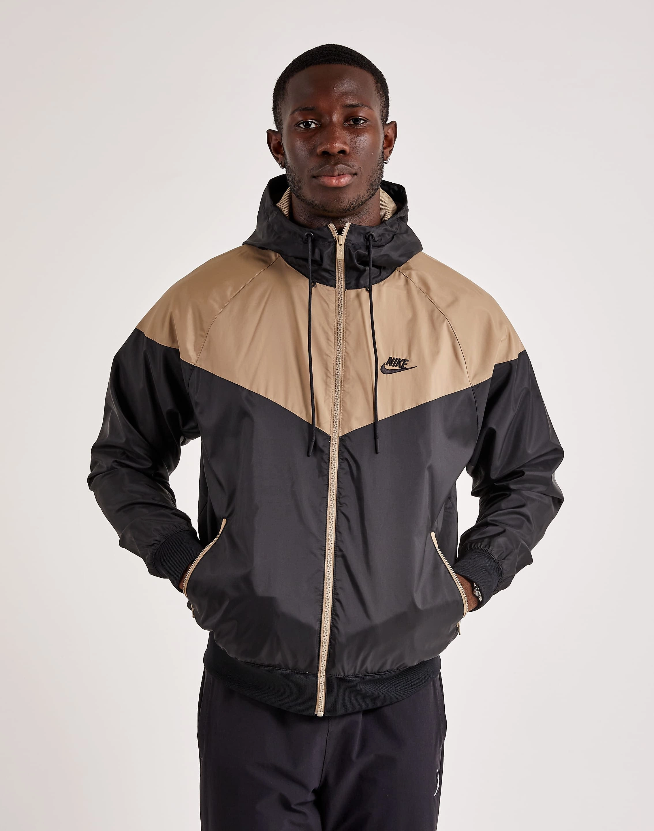Ethical fashion choices Nike Windrunner Hooded Jacket Wardrobe staples