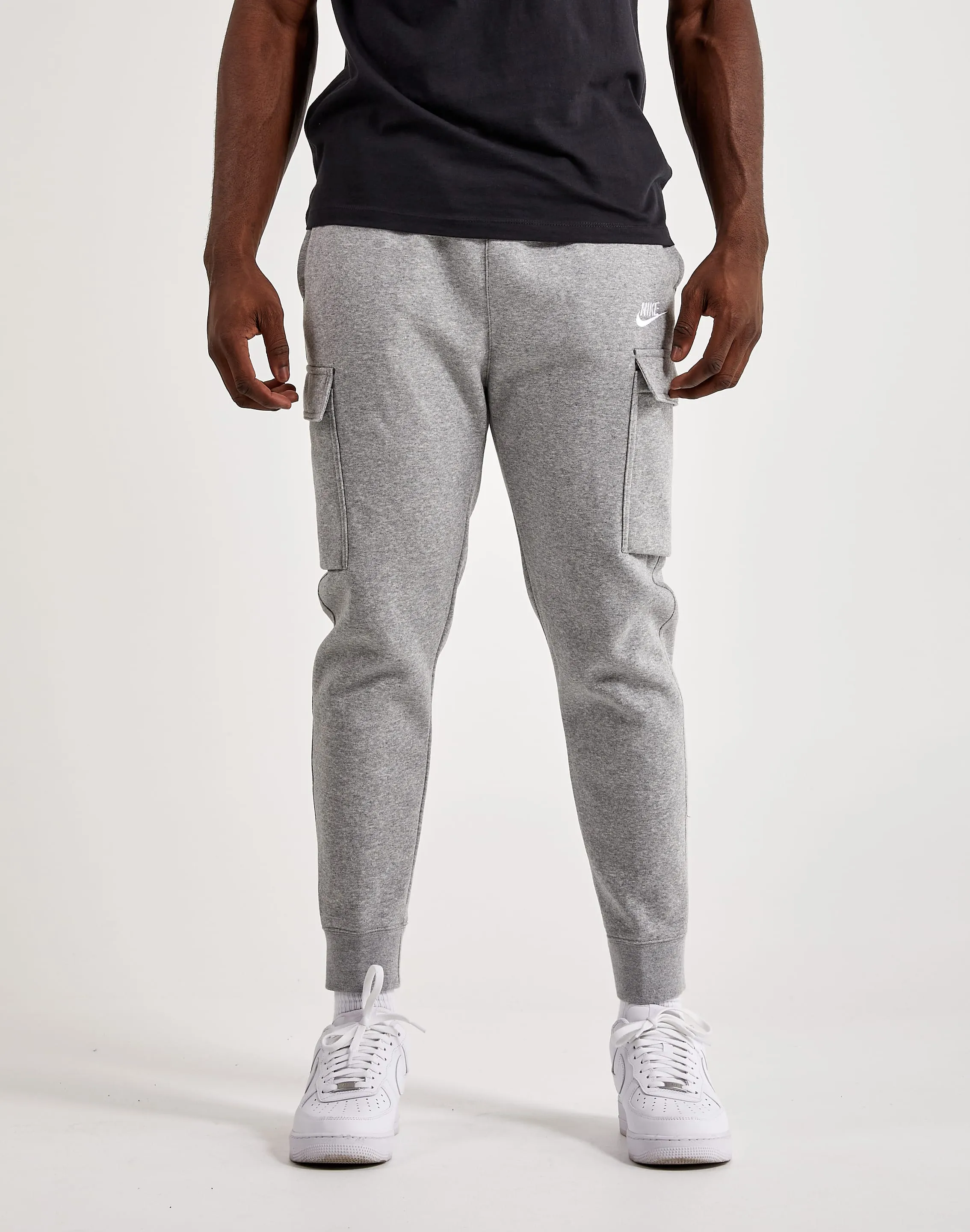 Wardrobe staples Nike Club Fleece Cargo Pants Sustainable fashion practices