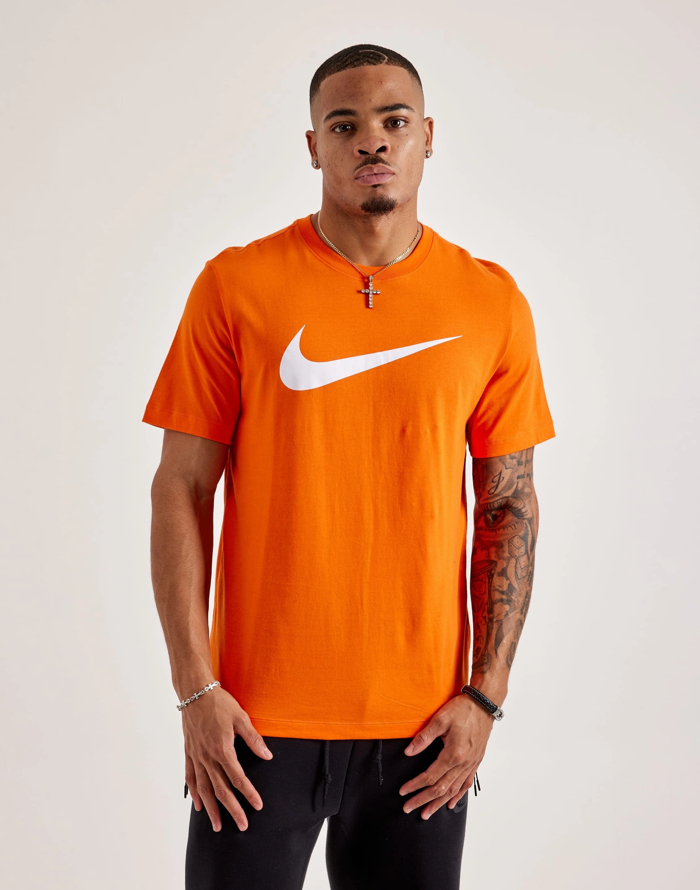 Nike Swoosh Tee Designer fashion items Fashion trends